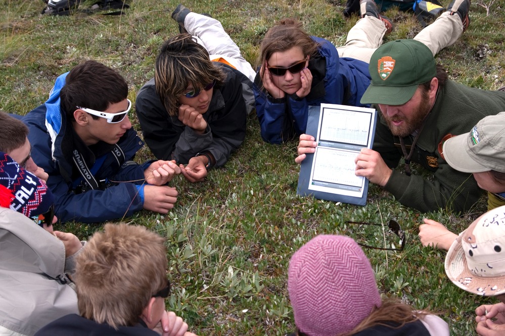 Kids interacting with a park ranger